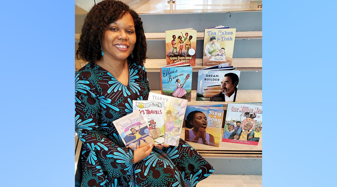 Author Kelly Starlings Lyon poses with her published books.