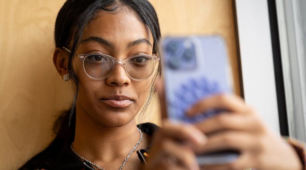 Close-up of a teenager taking a selfie.