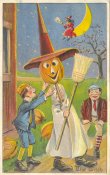 Postcard - illustration of two boys laughing, a third child in a witch costume with a pumpkin head, and a witch on a broomstick flying in the background